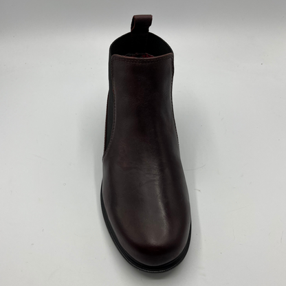 Brown leather boot on a white background