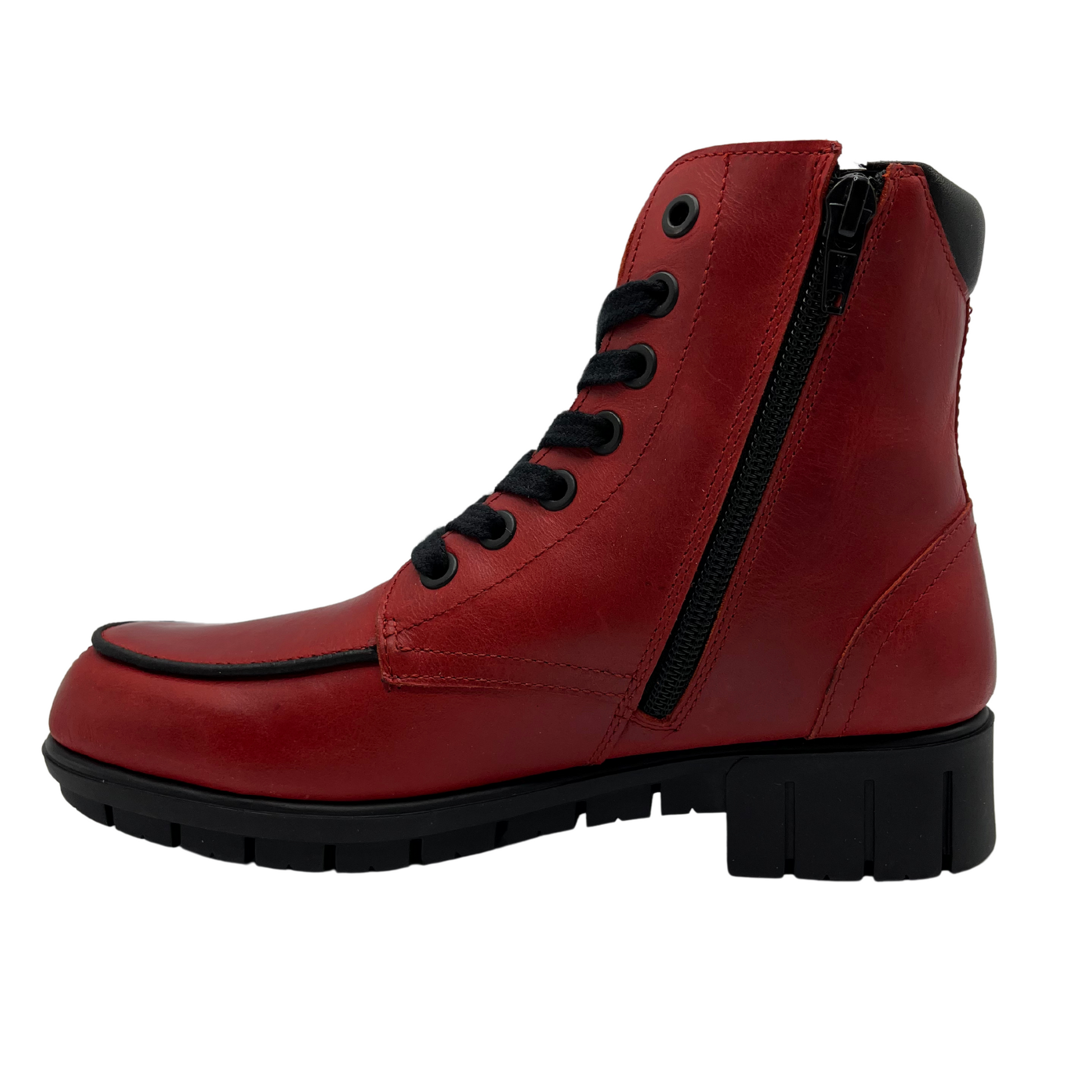 Left facing view of red leather short boot with black laces and short block heel on black rubber outsole