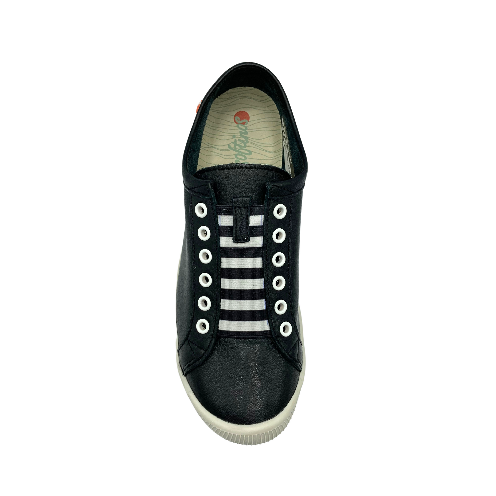 Top down view of black leather sneaker with white elastic laces and white grommets.