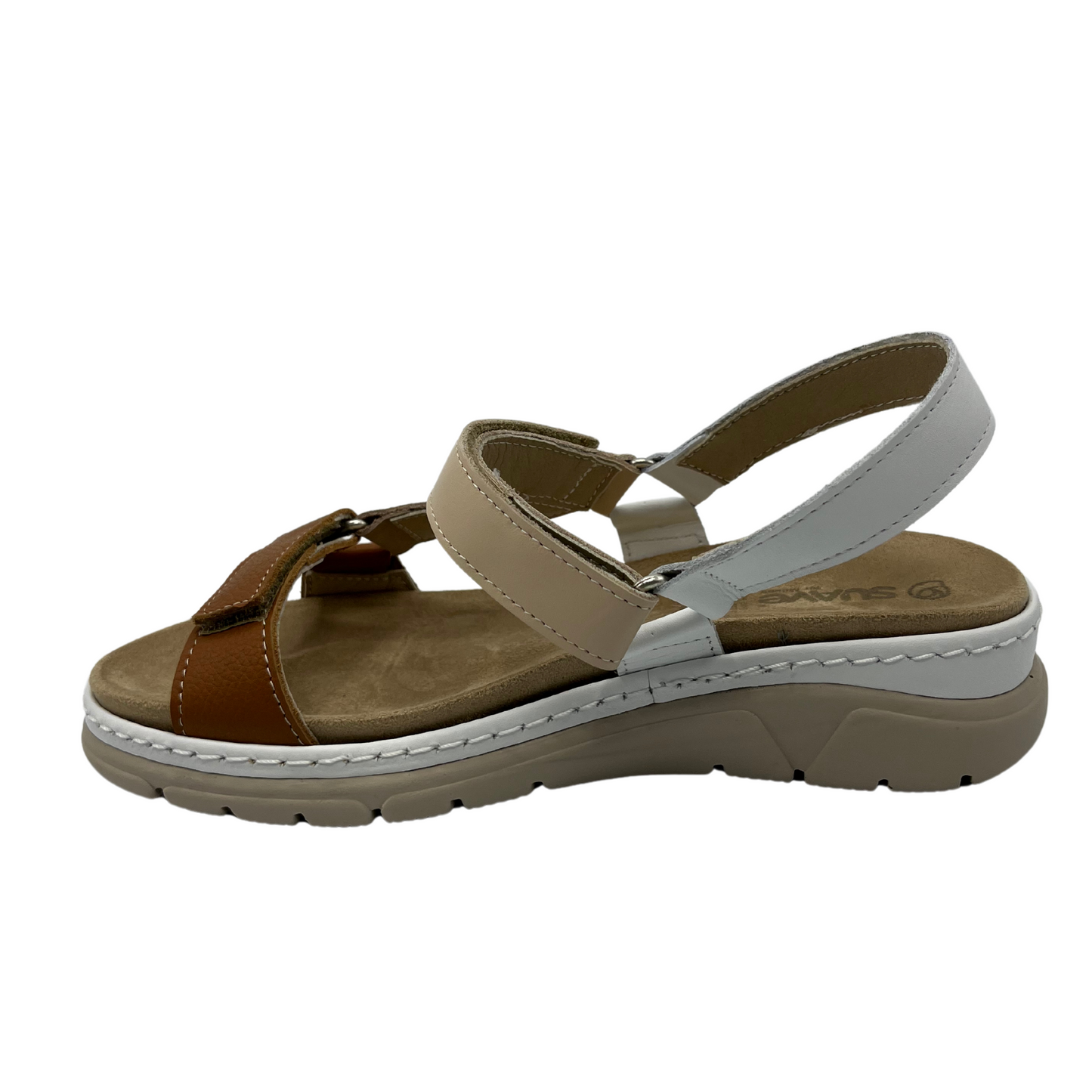 Left facing view of suede sandal with brown, white and tan straps