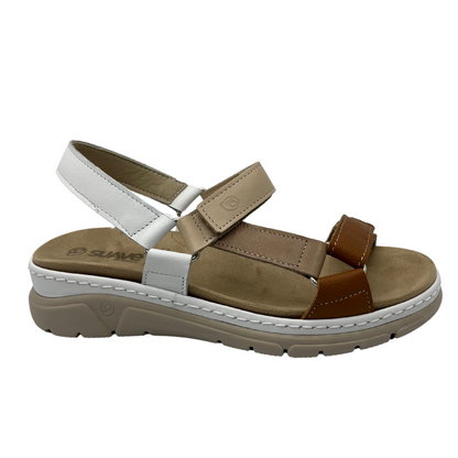 Right facing view of suede sandal with brown, white and tan straps