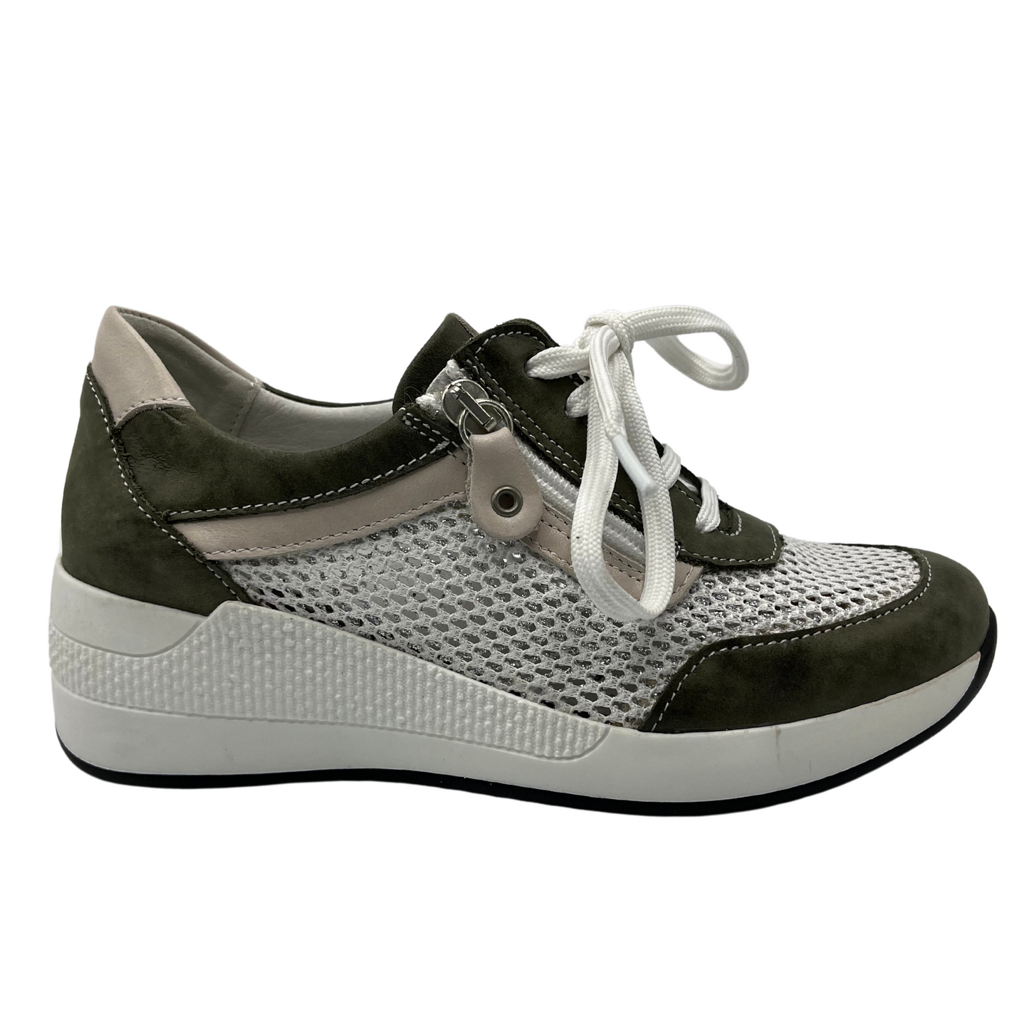 Right facing view of women's wedge sneaker with white laces, mesh sides and side zipper
