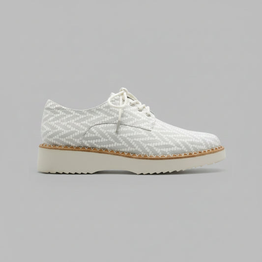 White brogue Tamara London, Addiction shoe with patterned toe cap.