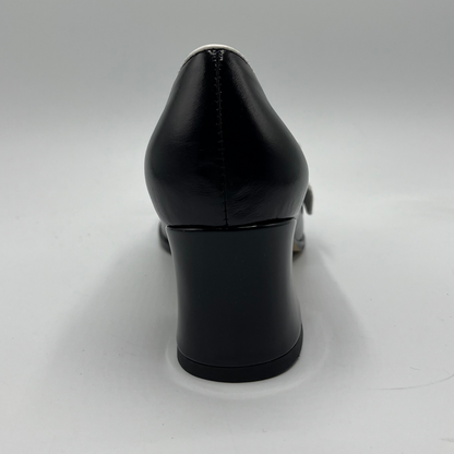 Black high-heeled shoe on a white background