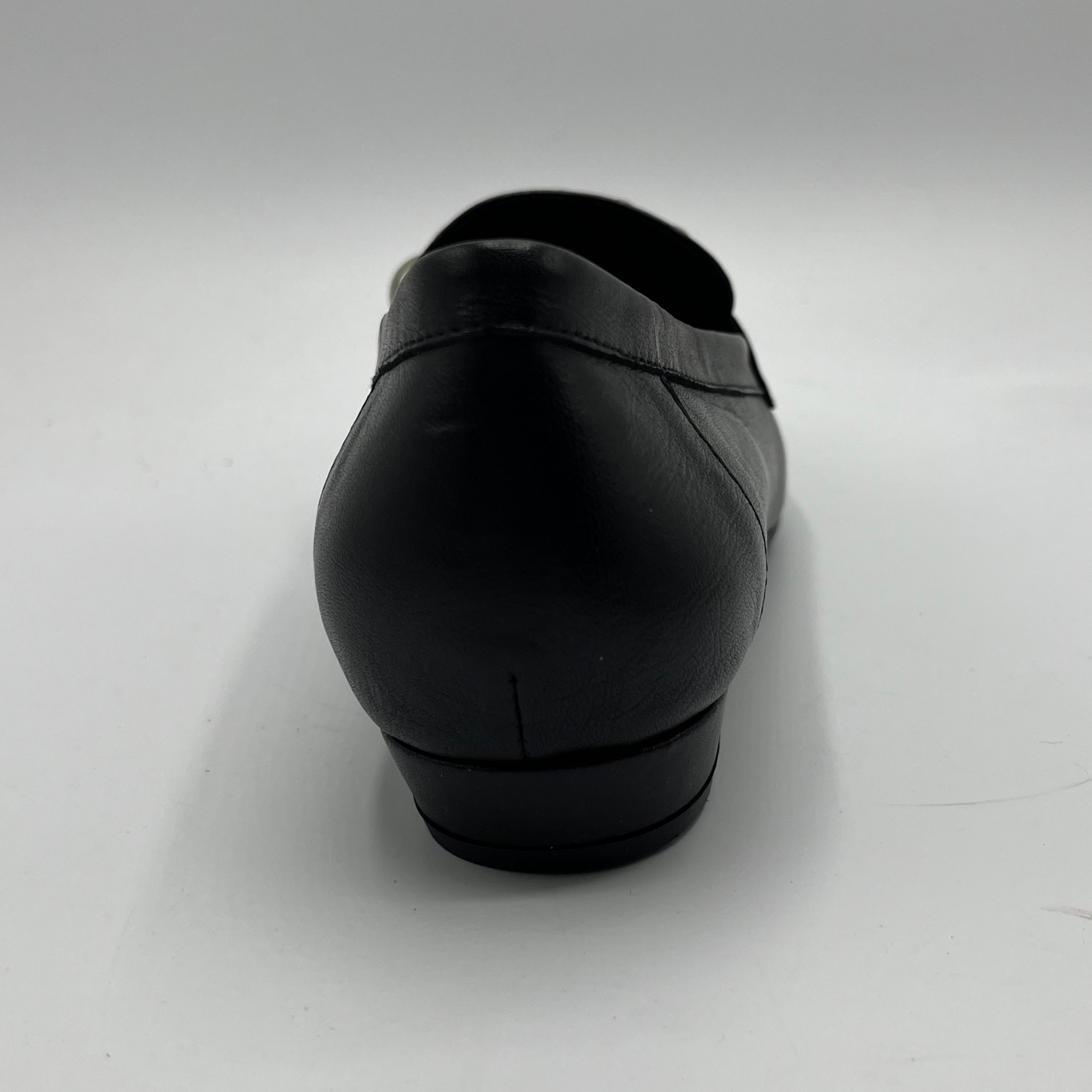 Black shoe on a white background