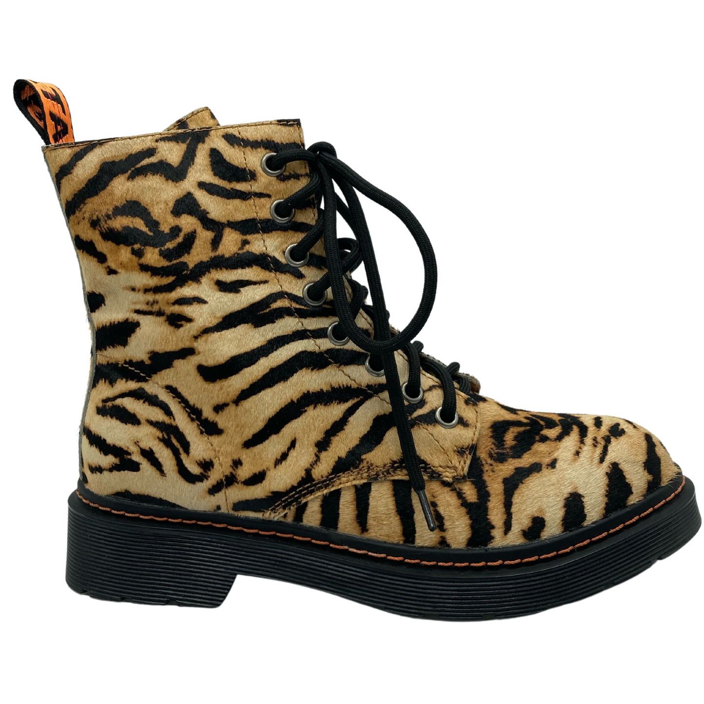Right facing view of tiger print combat boot with black rubber outsole and black laces
