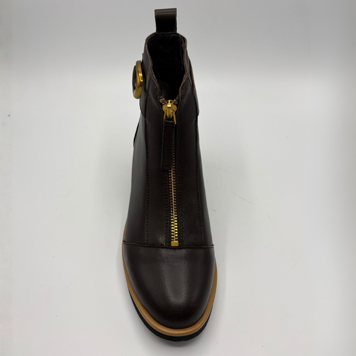 Front view of a leather short boot with a brown stacked heel
