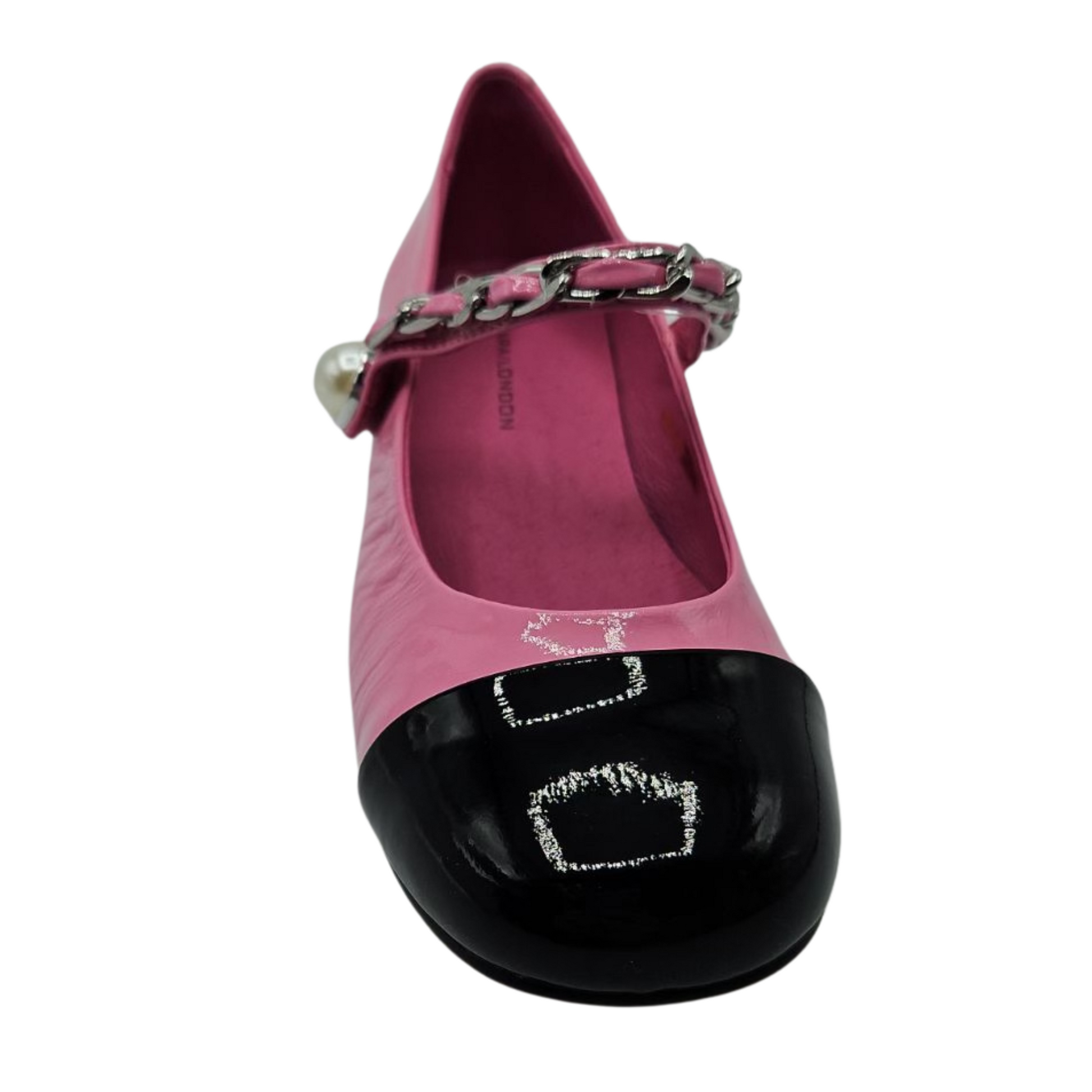 Front view of pink and black patent leather mary jane with pearl and chain details on the strap and short block heel