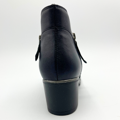 Black leather boot on a white background