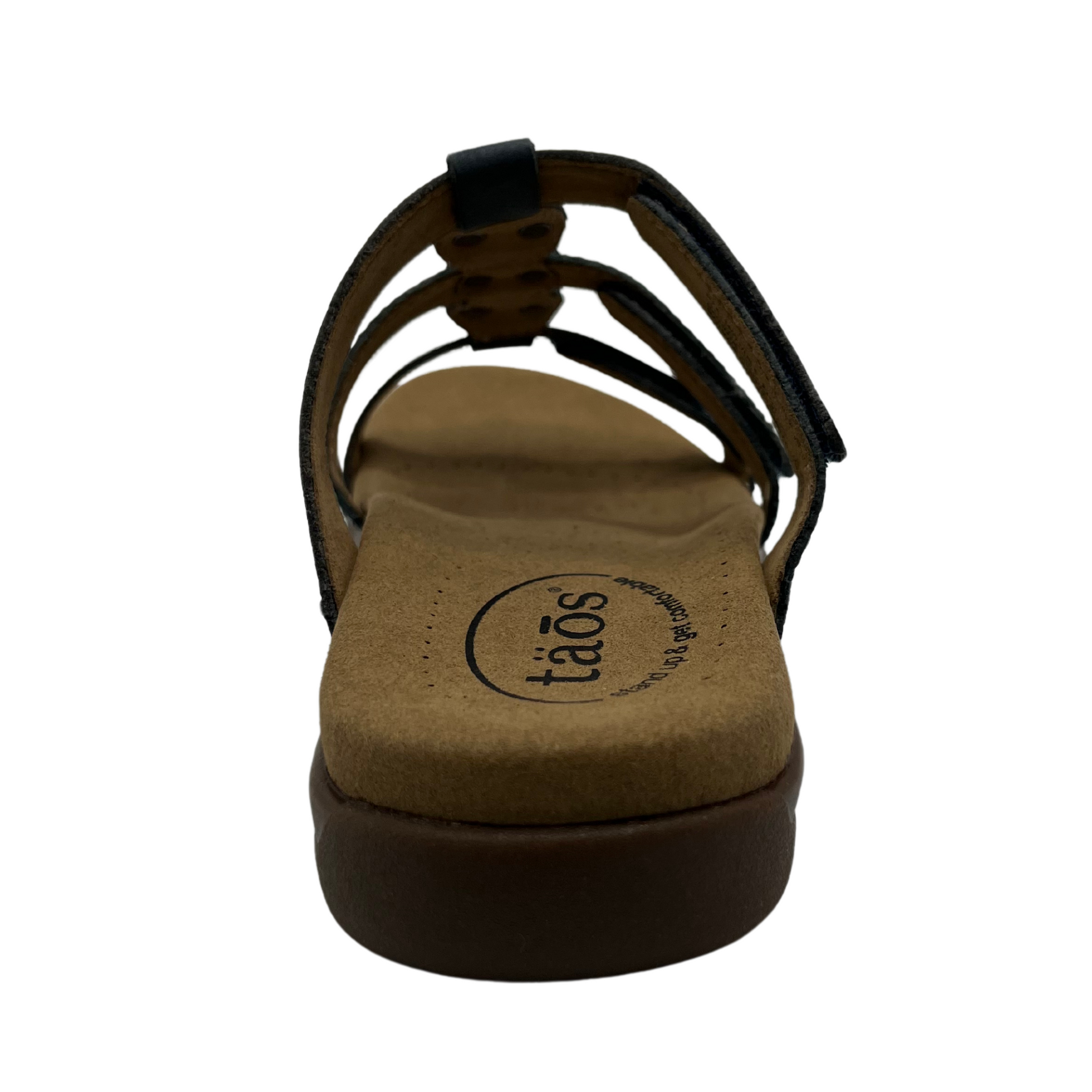 Back view of leather sandal with 3 straps and slip on style. Hook and loop closures on straps and lined anatomical footbed