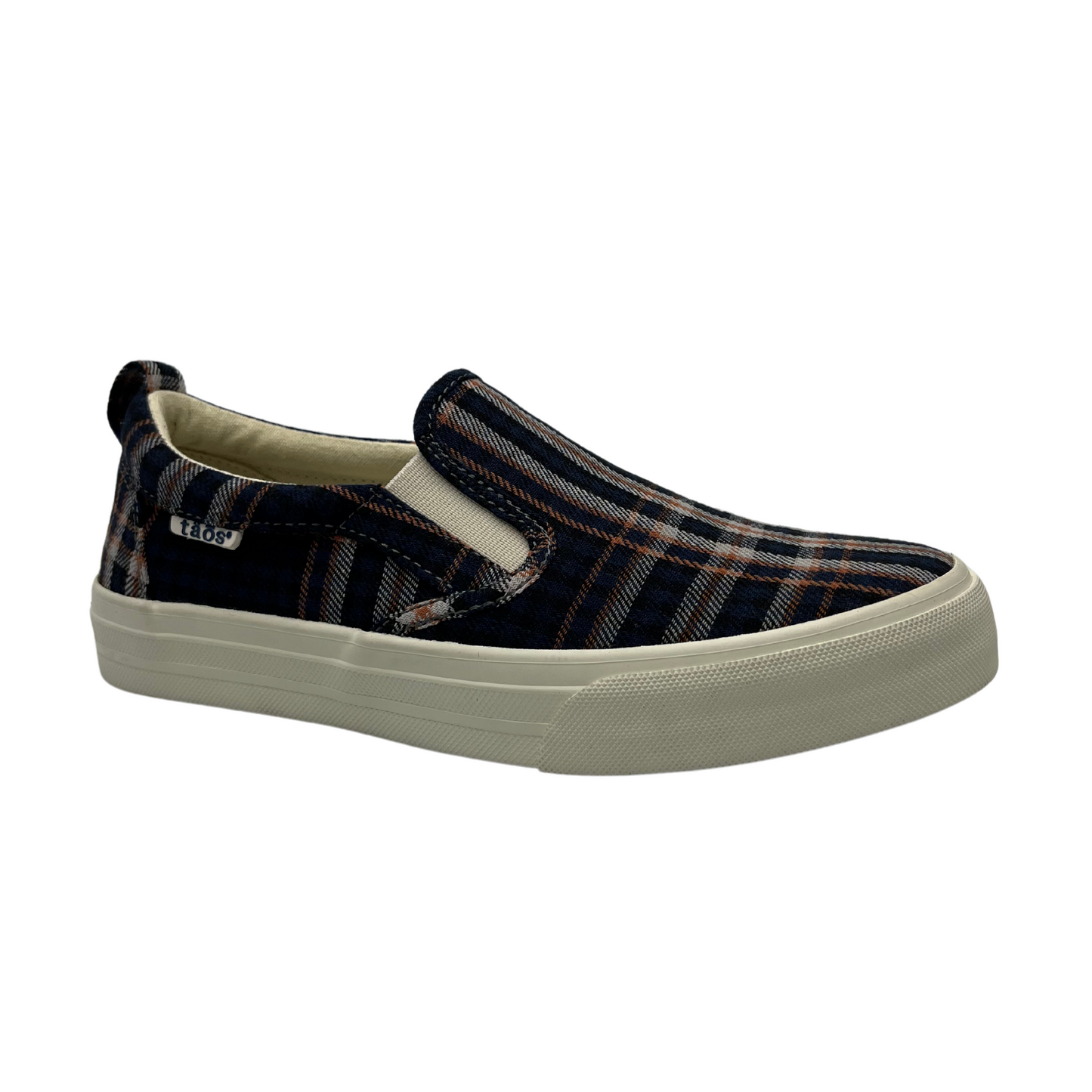 45 degree angled view of blue, orange and white plaid canvas slip on shoe with white rubber platform sole