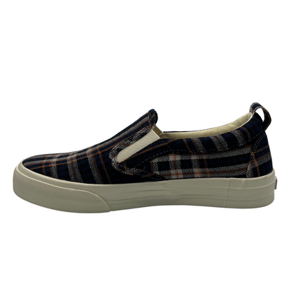 Left facing view of blue, orange and white plaid canvas slip on shoe with white rubber platform sole