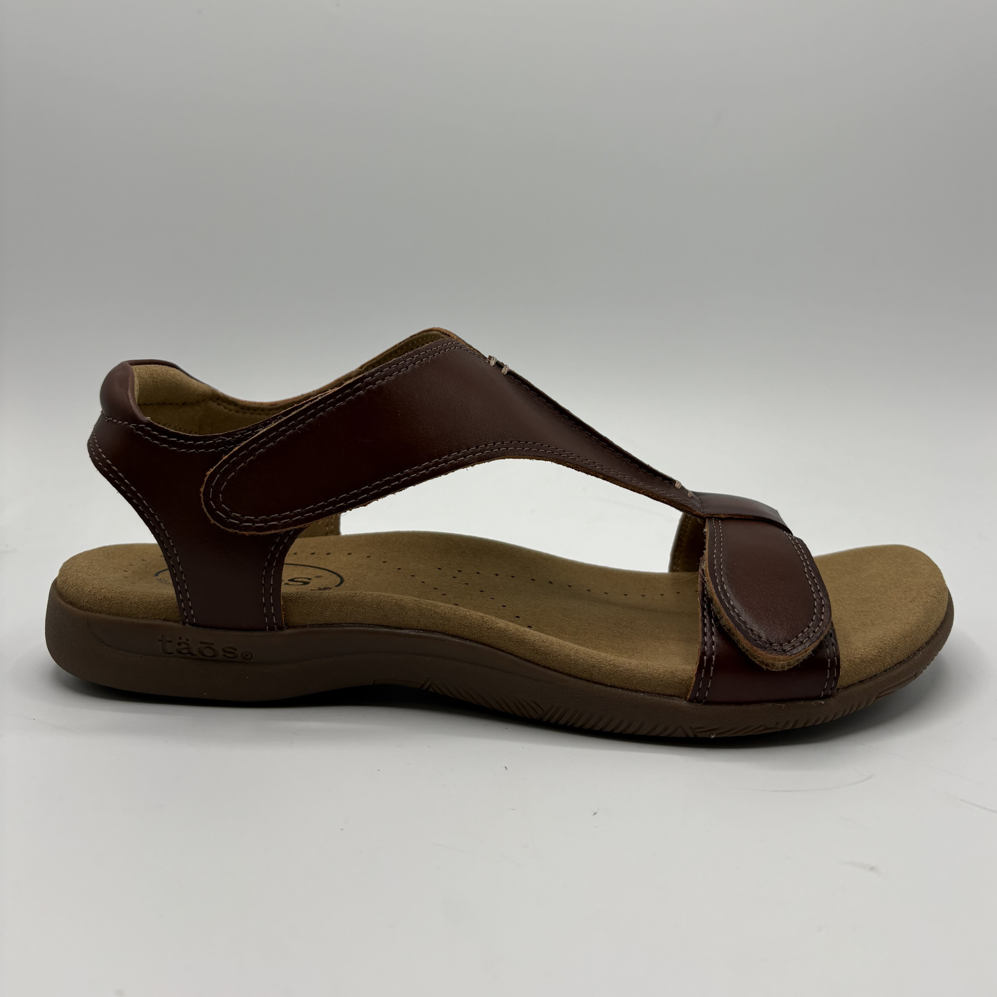 Brown sandal on a white background
