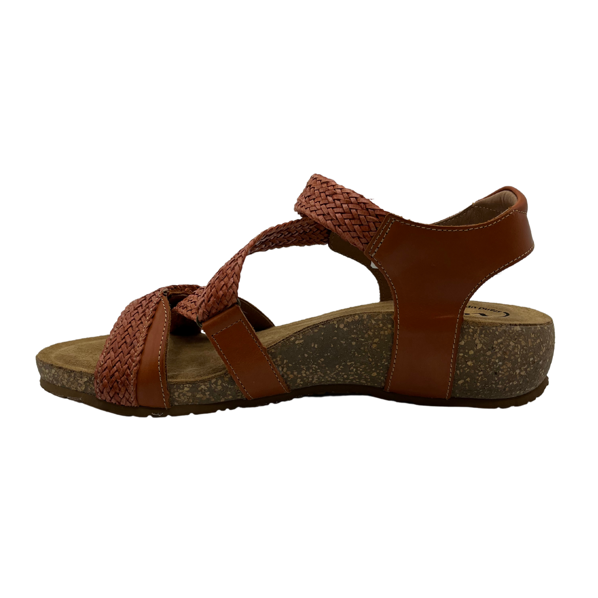 Left facing view of braided leather strapped sandal with contoured cork footbed covered with suede