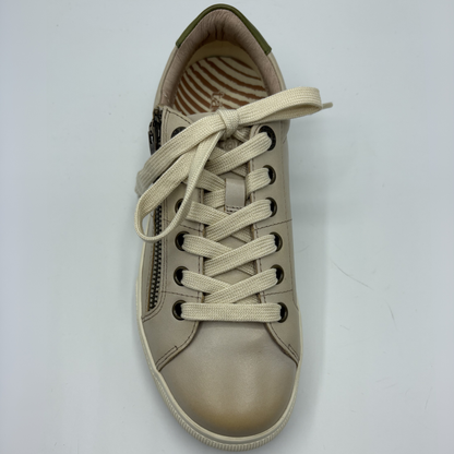 Beige sneaker with laces on a white background