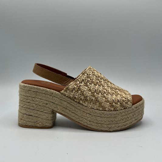 Right facing view of a chunky wedge heel with an elasticated slingback strap and peep toe.