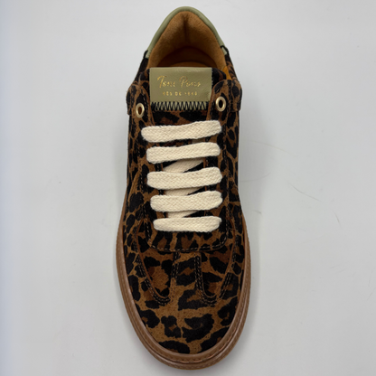 A single low-top sneaker shown from a top-down view on a light gray background. The shoe features a brown and black leopard print upper, thick cream-colored laces, and a tan sole.