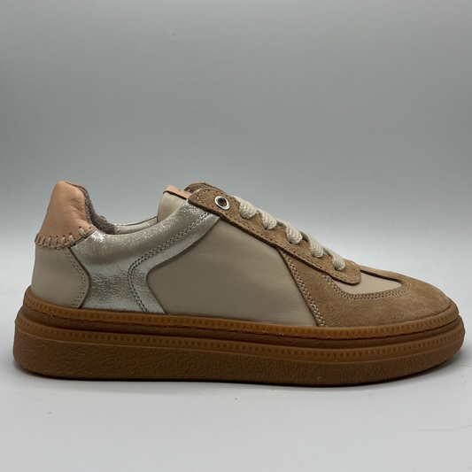 Beige and brown sneaker on a gray background