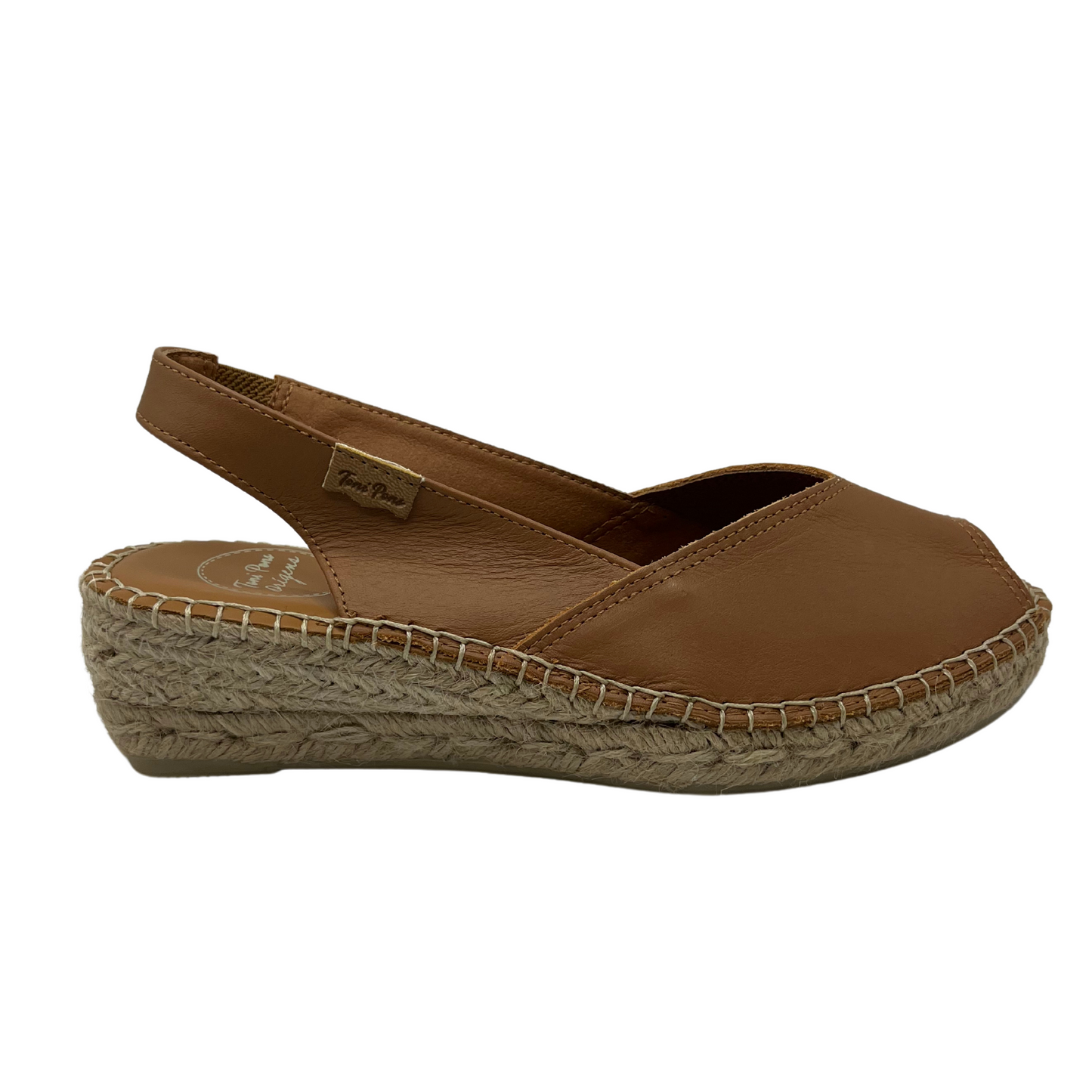 Right facing view of tan leather espadrille sandal with wedge heel and peep toe