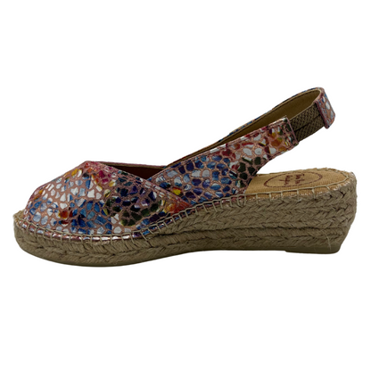 Left view of colourful leather upper espadrille shoe with sling back strap and slight wedge heel.