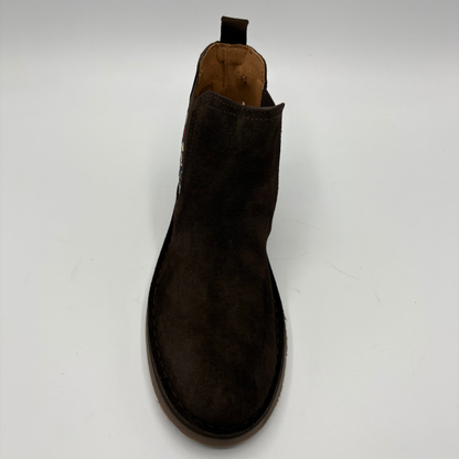 A dark brown suede Chelsea boot shown from a top-down angle on a light gray background.