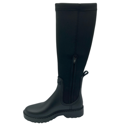 Left facing view of black rubber and lycra boot with side zipper closure