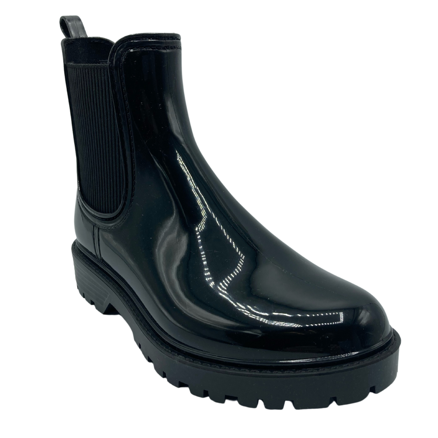 45 degree angled view of short black glossy rain boot with elastic sides and rubber outsole
