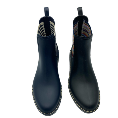 View of a pair of short rain boots, the left one is navy and the right one is black. Both have elastic side gores and pull on heel tabs