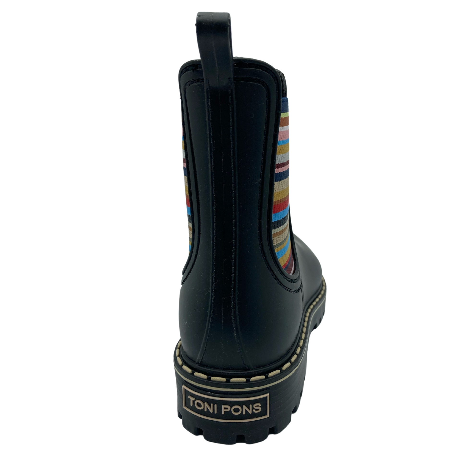 Back view of short rain boot with black rubber outsole and multicoloured elastic side gore