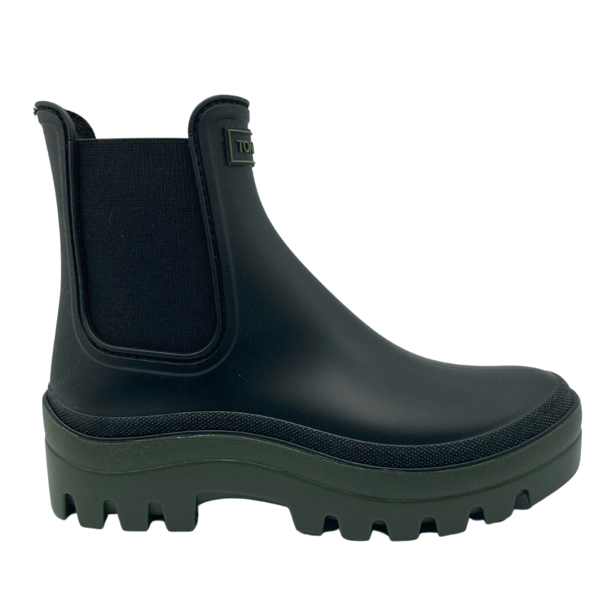 Right facing view of black chelsea boot with elastic sides and khaki platform sole