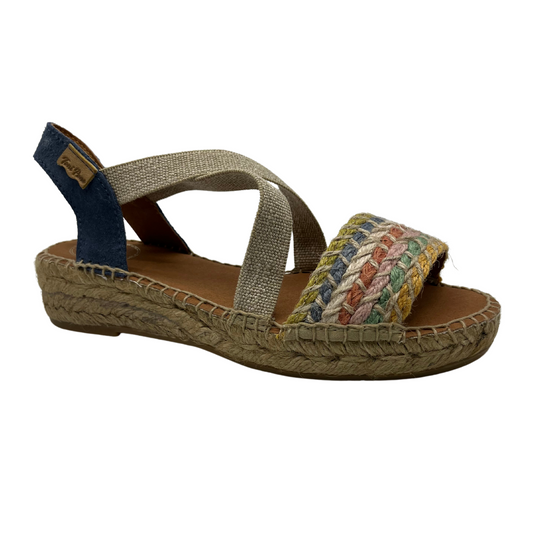 45 degree angled view of women's espadrille with non-slip rubber bottom and hand stitched details.