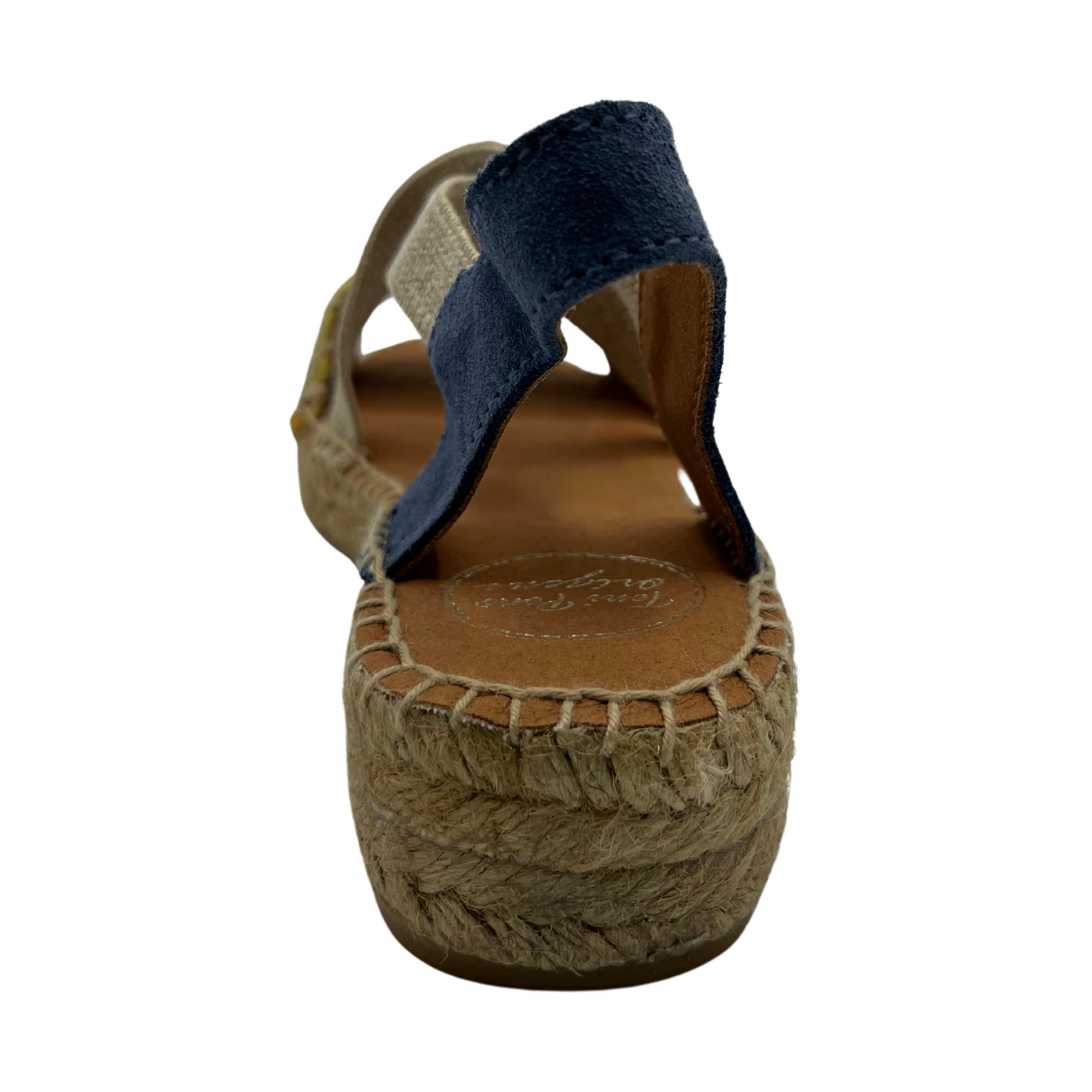 Back view of women's espadrille with non-slip rubber bottom and hand stitched details.