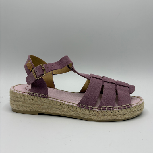 Purple sandal with jute sole on a gray background
