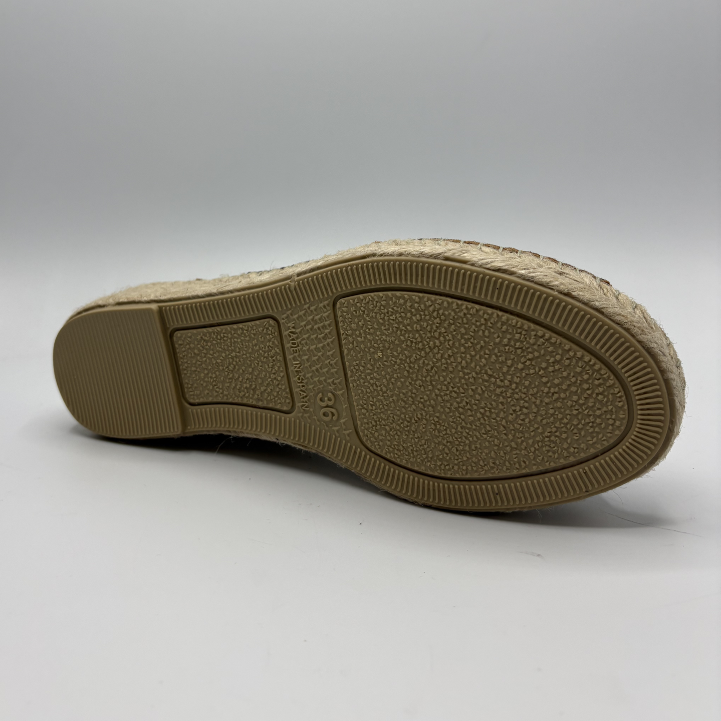 Brown shoe sole on a white background
