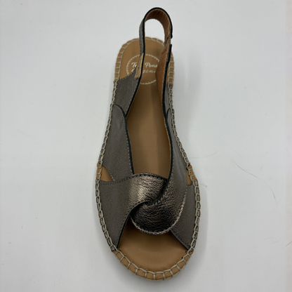 Bronze sandal with brown sole on a white background