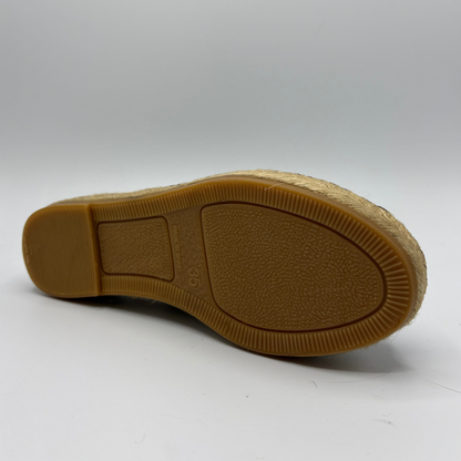 Brown sole of a shoe on a white background