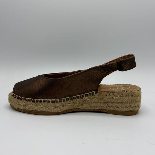 Brown espadrille sandal on a white background