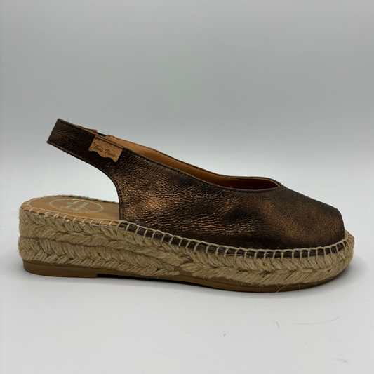 Brown espadrille sandal on a white background