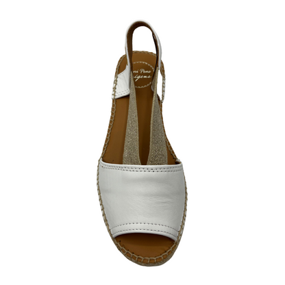 Top view of white leather sandal with rounded toe brown lining