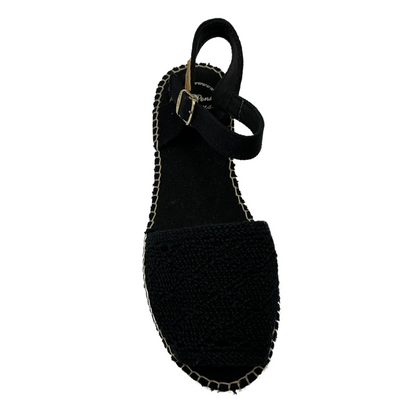 Top view of black macrame sandal with peep toe and ankle buckle strap