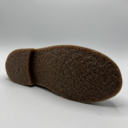 Brown shoe sole on a white background