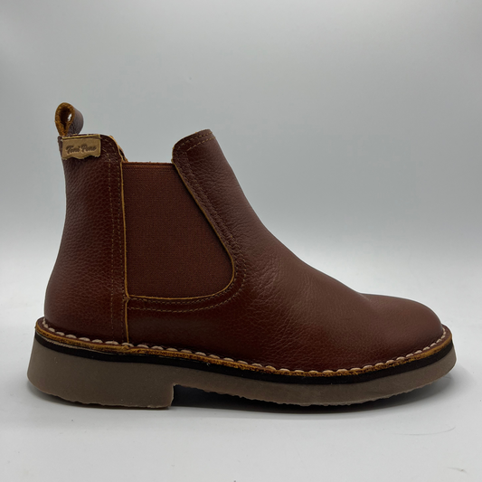 Brown leather boot on a white background
