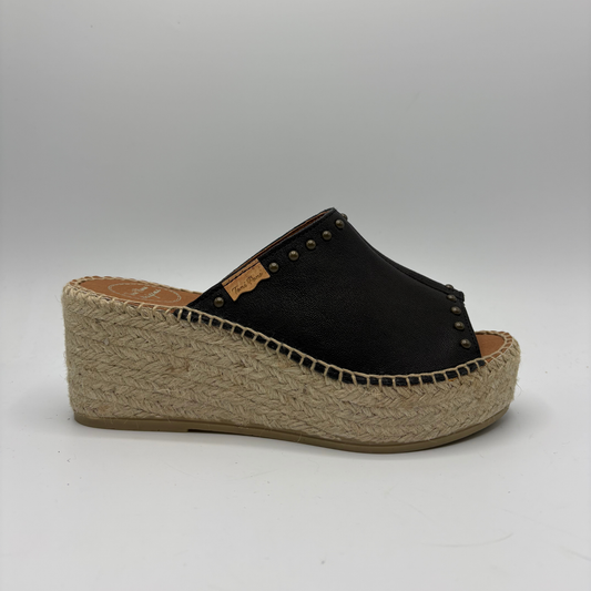 Black wedge sandal with jute sole on a gray background