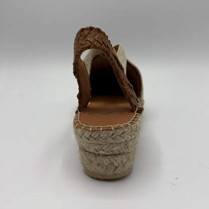 Brown woven sandal on a white background