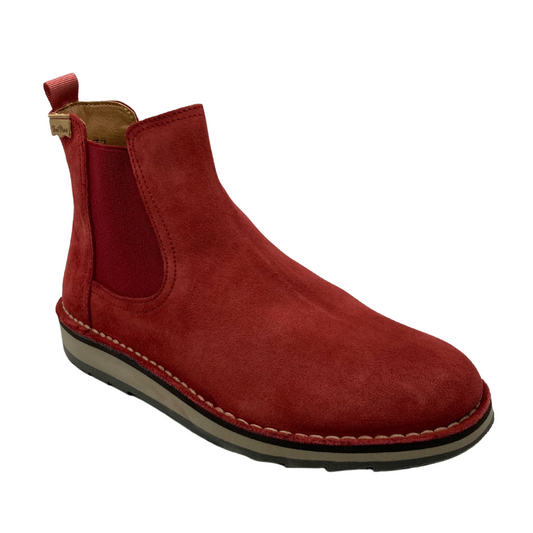 45 degree angled view of red leather short boot with inset red elastic gore and pull on tab