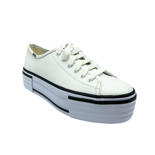 Angled side view of a platform sneaker in white leather with white laces