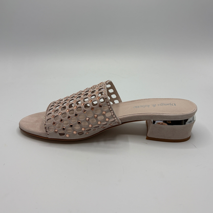 Beige sandal with cut-out design on a light gray background