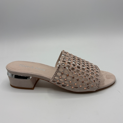 Nude sandal with decorative cut-out design on a gray background