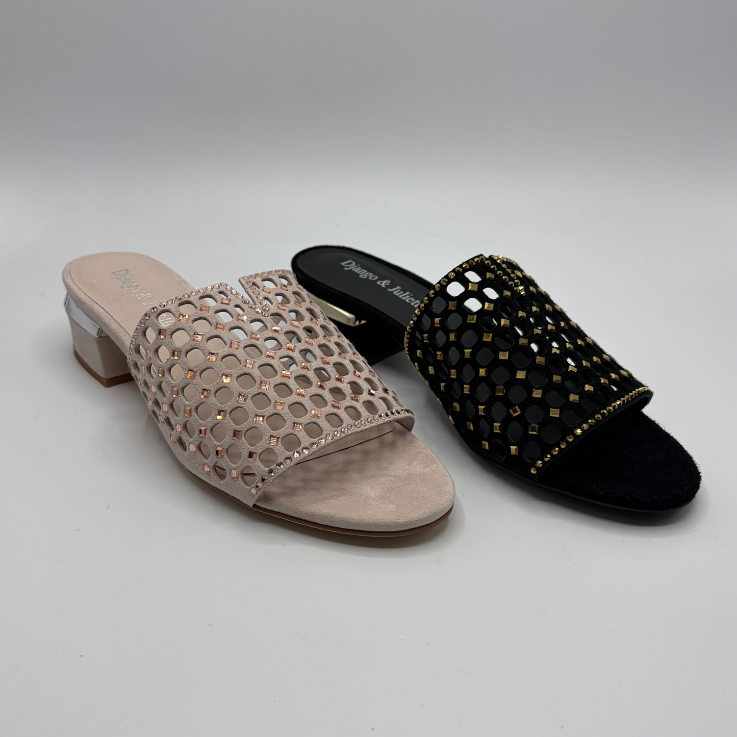 Pair of embellished sandals on a gray background
