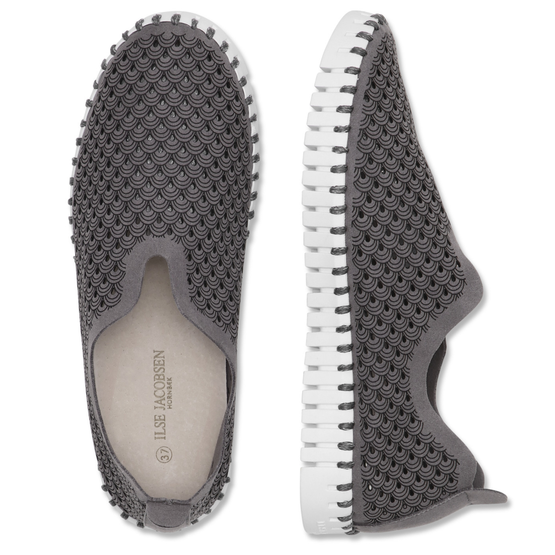 Top view of a pair of grey slip on shoes